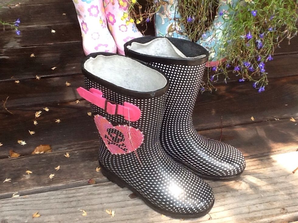 Best find is a cute pair of rainboots on the cheap at a thrift shop.   These are too small for me to use as boots but perfect for using as planters...they are waterproof, and usually have a lining.