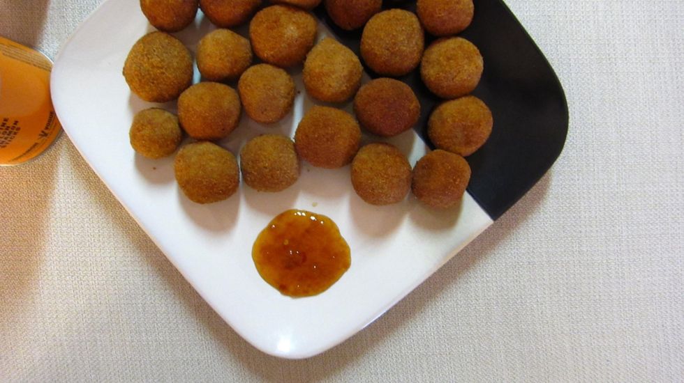 Best is to dip it in hot chili chutney. The sweetness and hotness of the chutney blends well with the fish cutlets. Or you can try some Sri Lankan MD brand Ketchup which is fabulous.