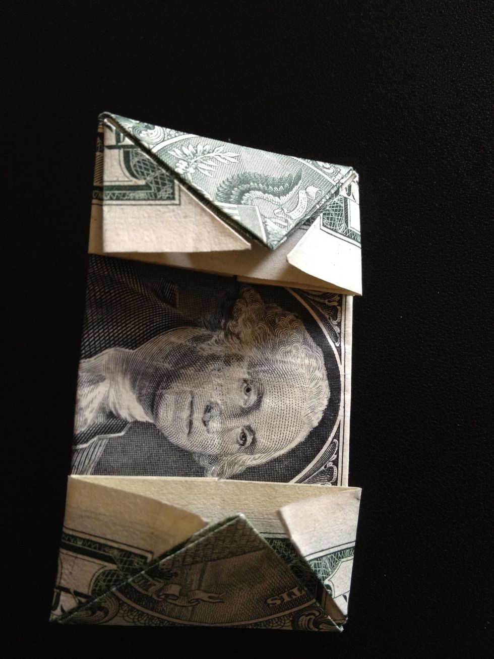 Bill with both sides folded backwards