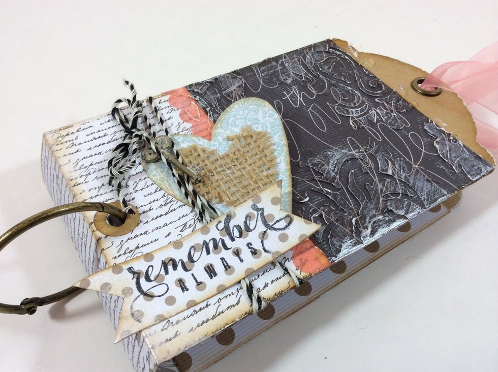 Bind envelopes inside cover using a binding ring.