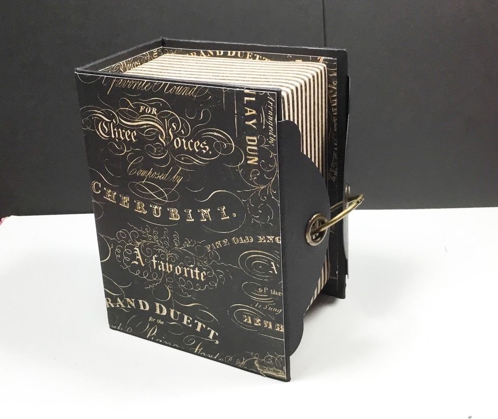 Binder ring holds the box closed perfectly.