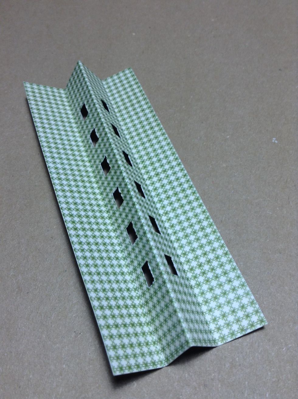 *BINDING THE PAGES: Cut a pice of paper 3 x 4 inches. Fold as seen in image and slide the paper into the Bind-it-All.