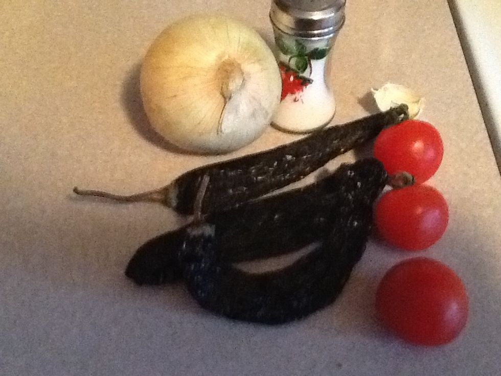 Black chiles,tomatoes,salt,garlic,onion.