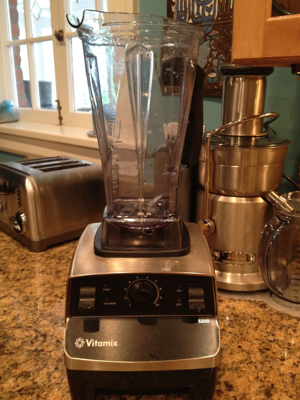 Blend all ingredients (except water- that comes next) in Vitamix for 30 seconds. (A blender works too!)