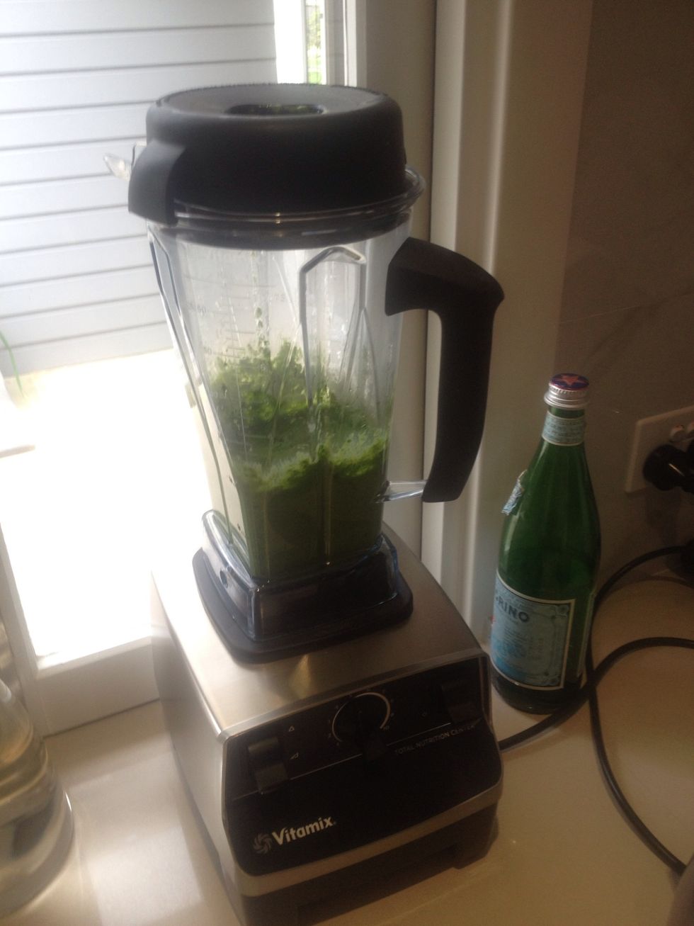 Blend at medium speed for 40 seconds. Add more Parmesan if you want a chunkier consistency or more olive oil if you want it wetter. Taste and adjust with salt and pepper.