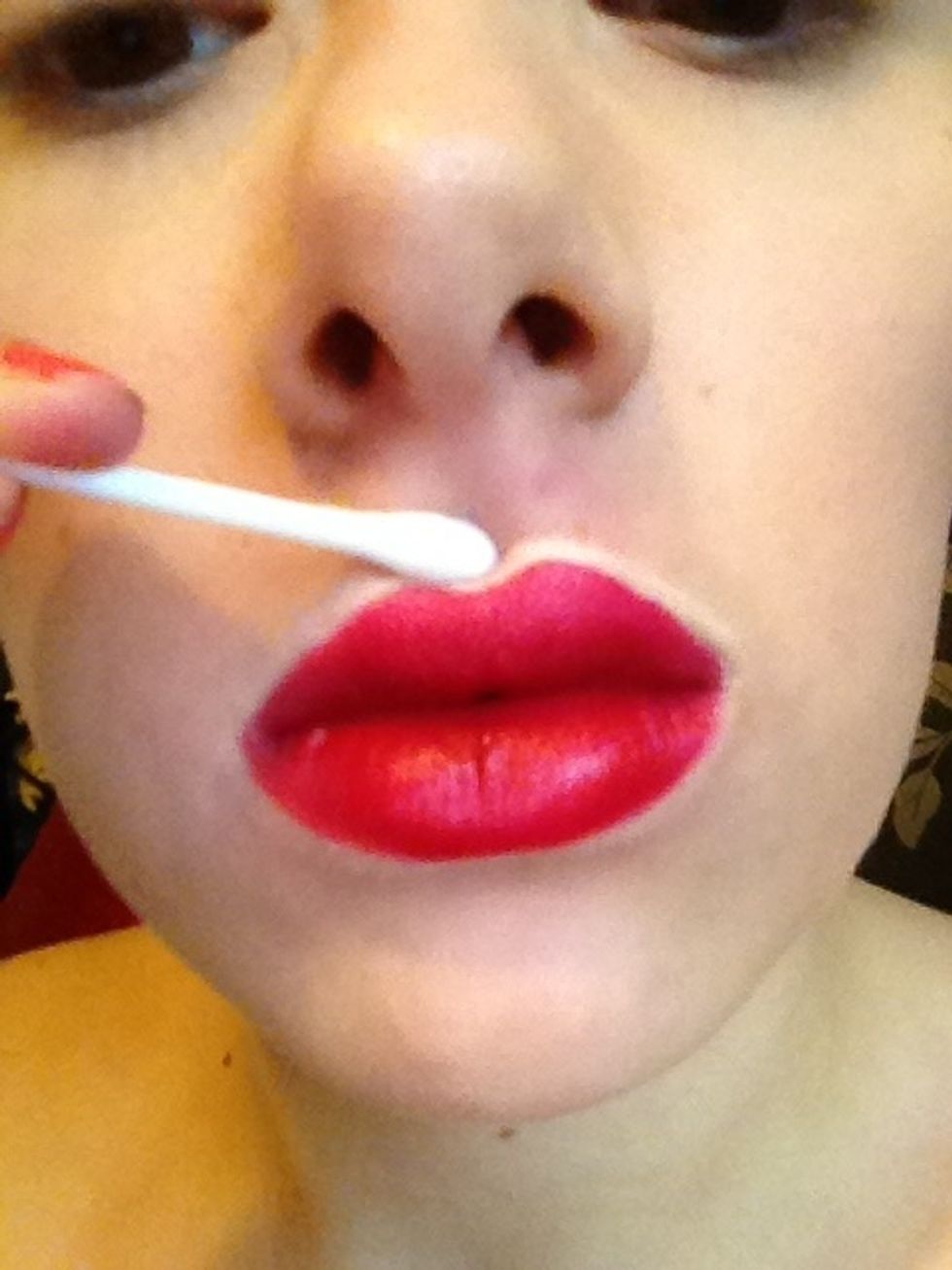 Blend carefully with your fingers and for the hard to reach spots close to your lips use a cotton bud