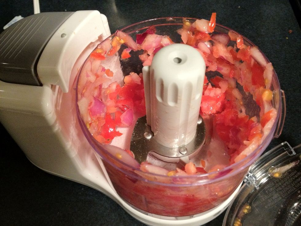 Blend for 5-10 seconds until the onions and tomatoes are cut up nicely but not a paste!