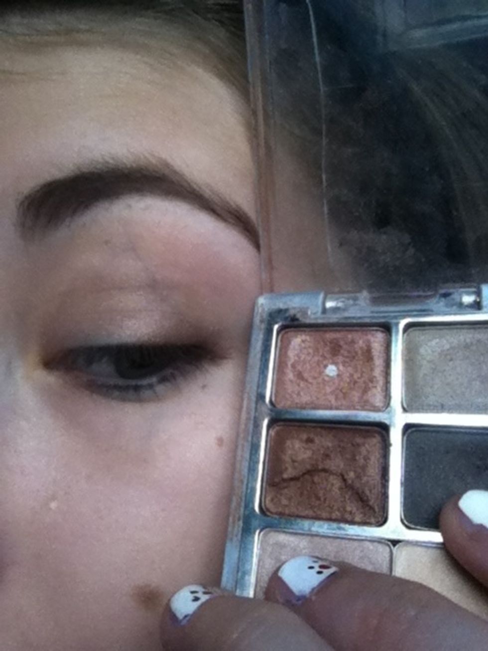 Blend grey into the crease of the eyelid.