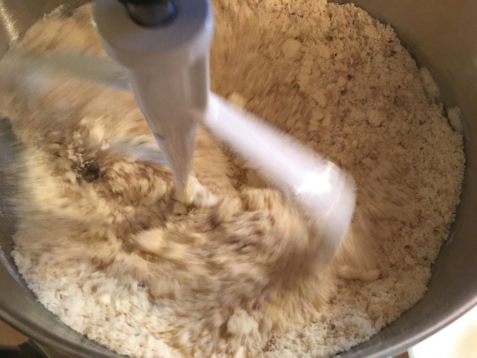 Blend in ground walnuts lightly.