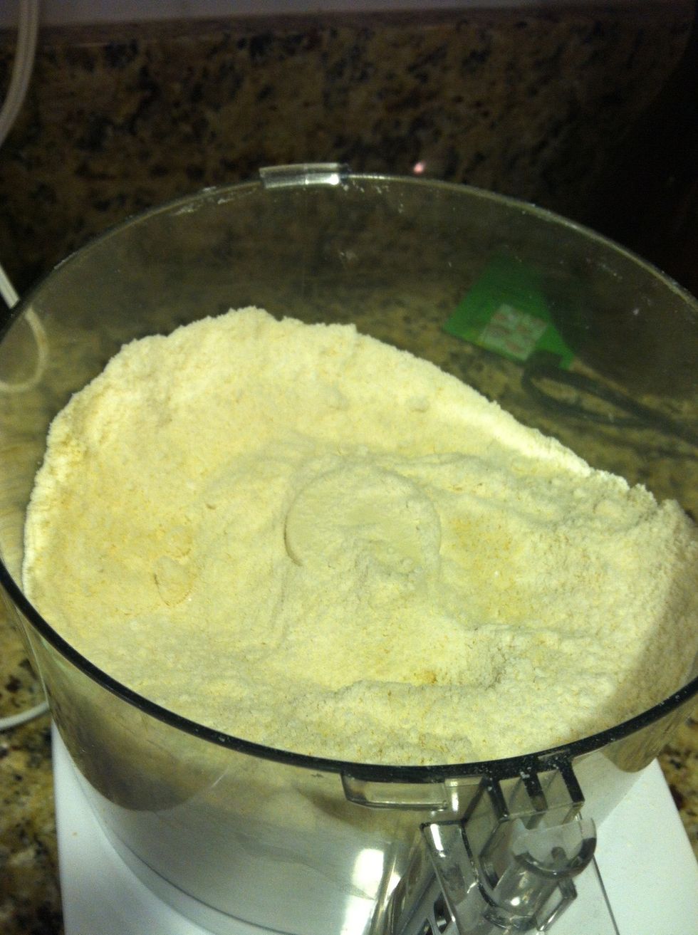 Blend the flour mixture with the butter until it forms the consistency of course crumbs.