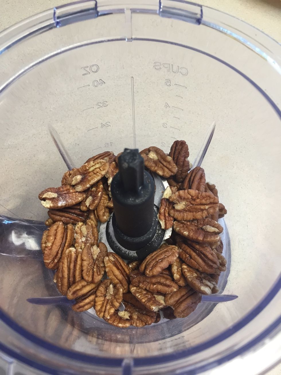 Blend the pecans and the sugar into powder