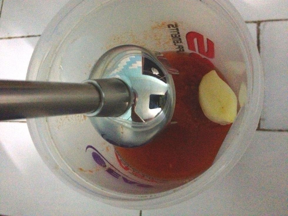 Blend the tomatoes and garlics using blender until smooth