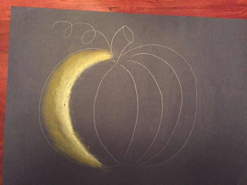 Blend the white into the orange using your tissue.