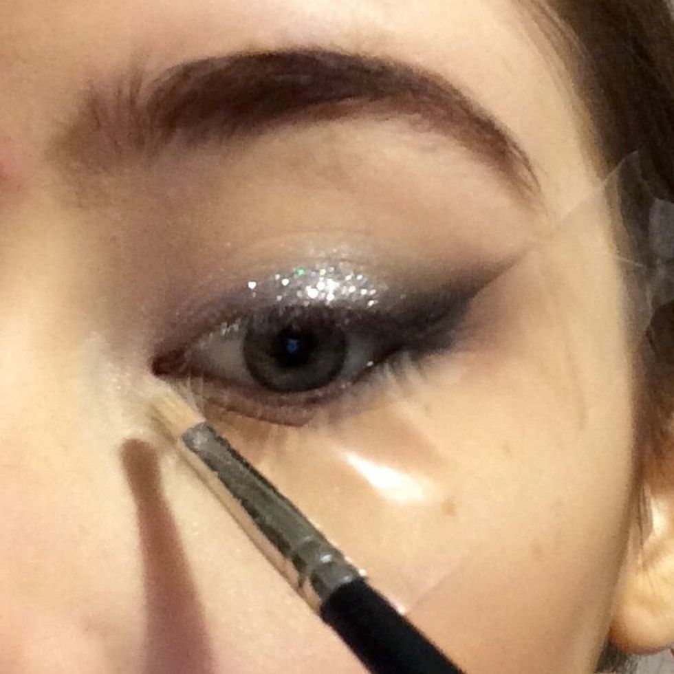 Blend this into the inner corner of the eye, this will act as our highlight...