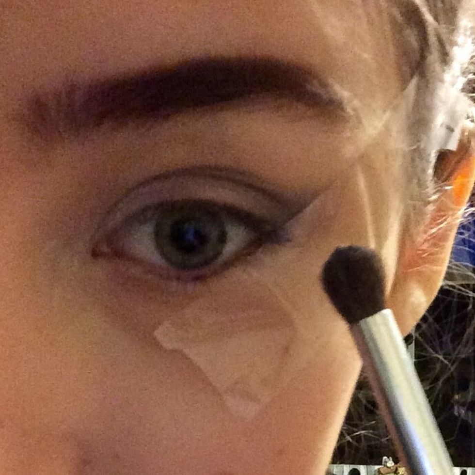 Blend this into the outer third of the eye and into the crease...