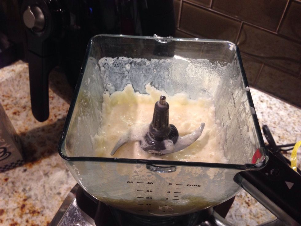 Blend together 1/2 cup skim milk, 1/2 cup lite egg nog and 1 cup ice until until thoroughly blended and crushed.