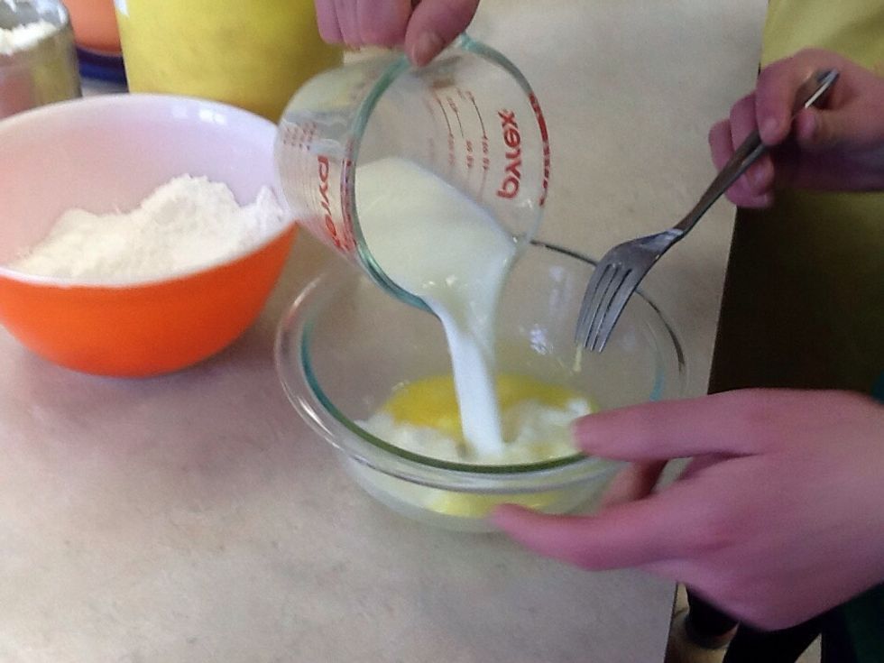 Blend together egg and milk in a small bowl