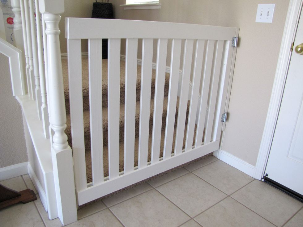 Block the stairs - a baby should not be wandering on or near the stairs. A baby proofing item called baby gate is perfect for indoor home stairs: http://www.itsbaby.com/baby-safety-gate-review/