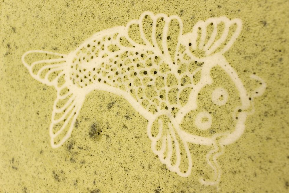 BLOOPER: I didn't pipe the cake batter into my design well enough hence all the air bubbles.