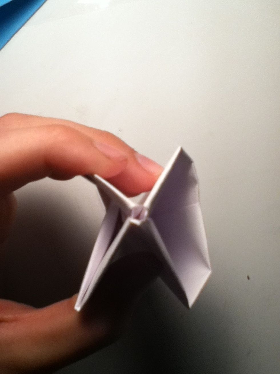 Blow into the opening at the bottom of the model