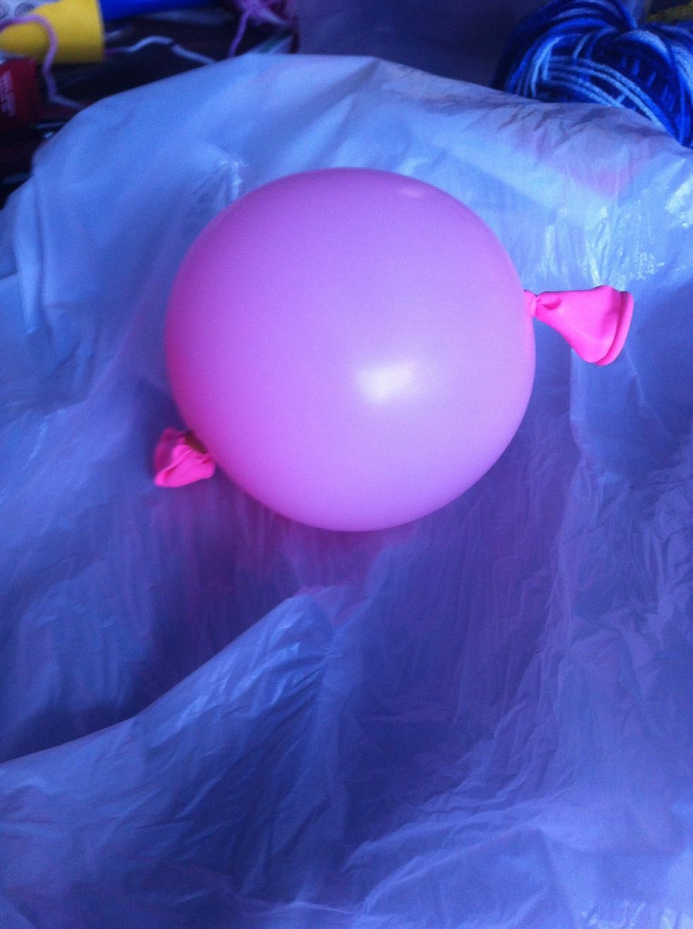 Blow up a balloon to desired size. Then i tied up the end to make it well rounded