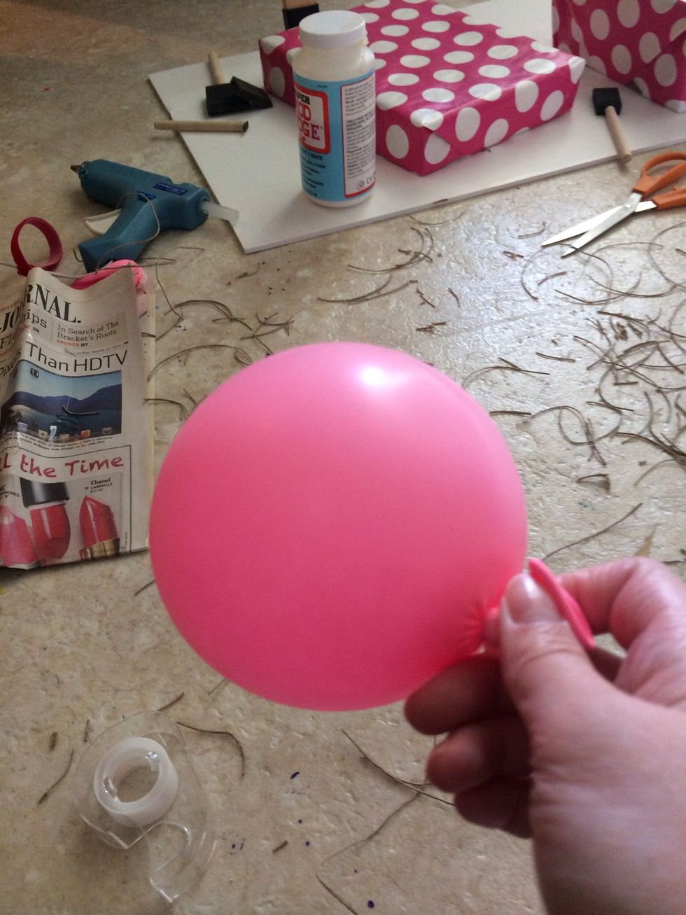 Blow up a small balloon