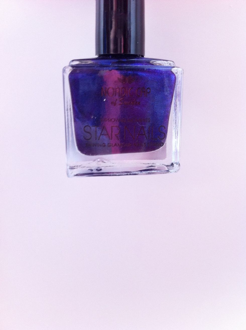 Blue/purple nail polish. It's from Nordic cap (star nails)