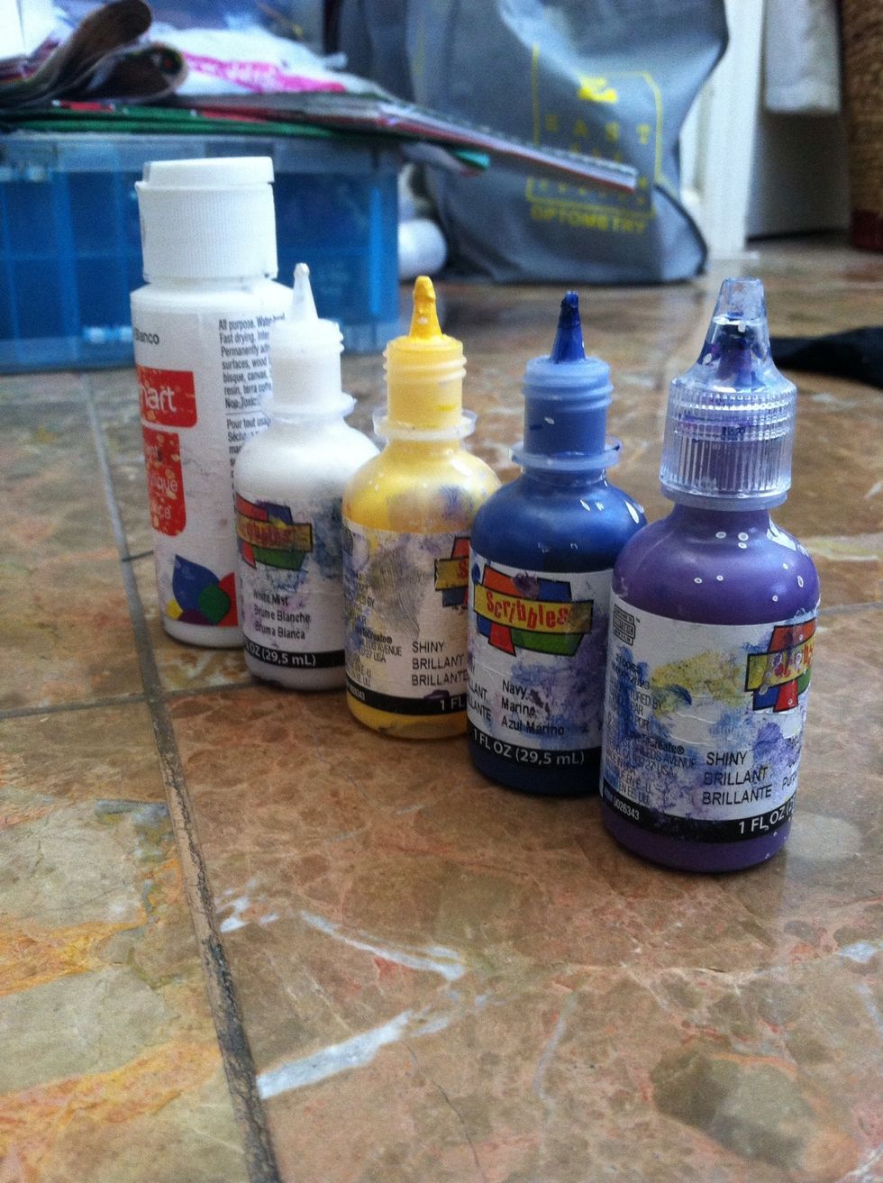 Blue, yellow, purple, and silver fabric paint. (or any galaxy colors you want.) White acrylic paints