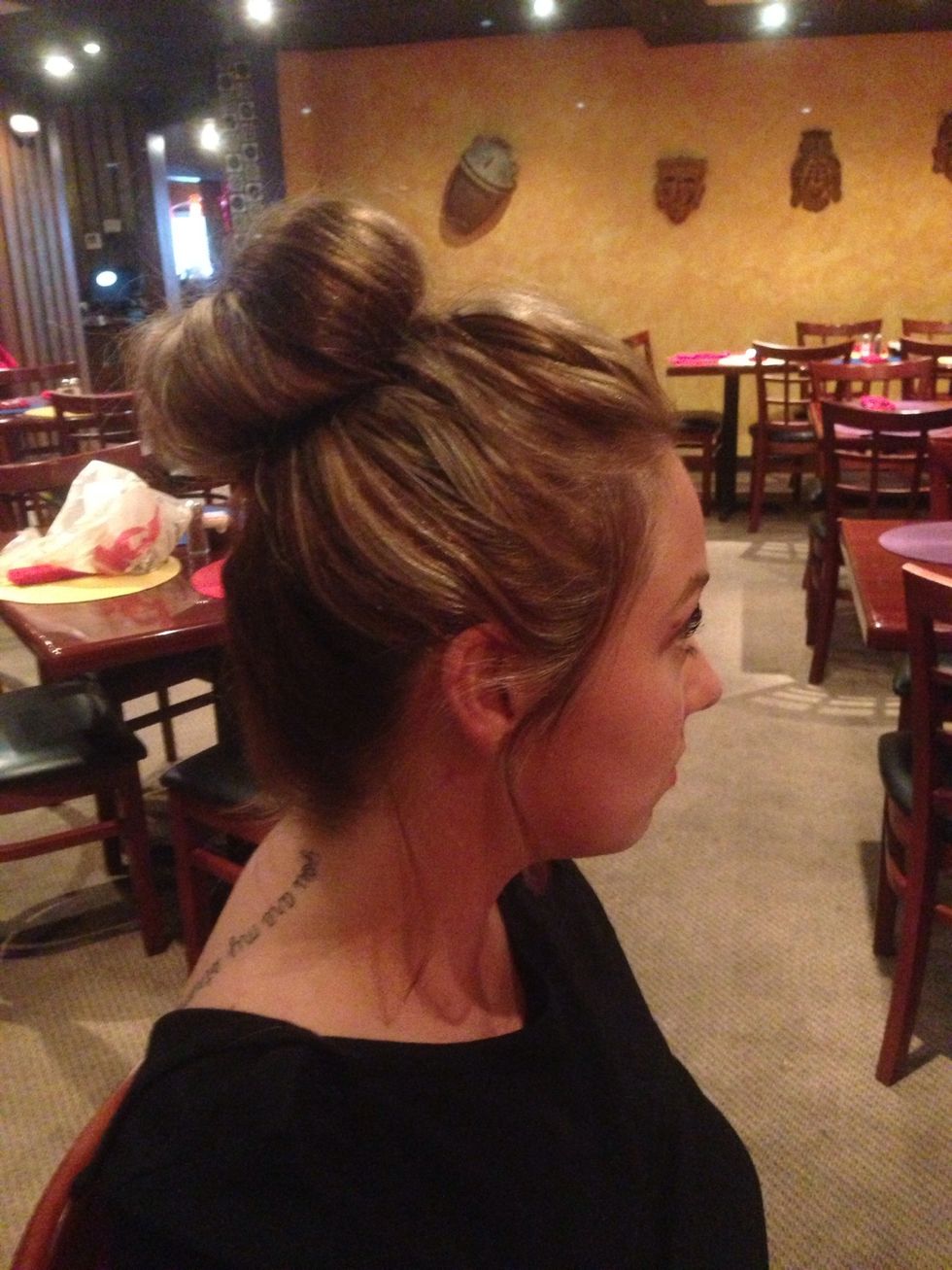 Bobby pin in down taking very thin strands of hair and there you go! A sock bun made with napkins. :)
