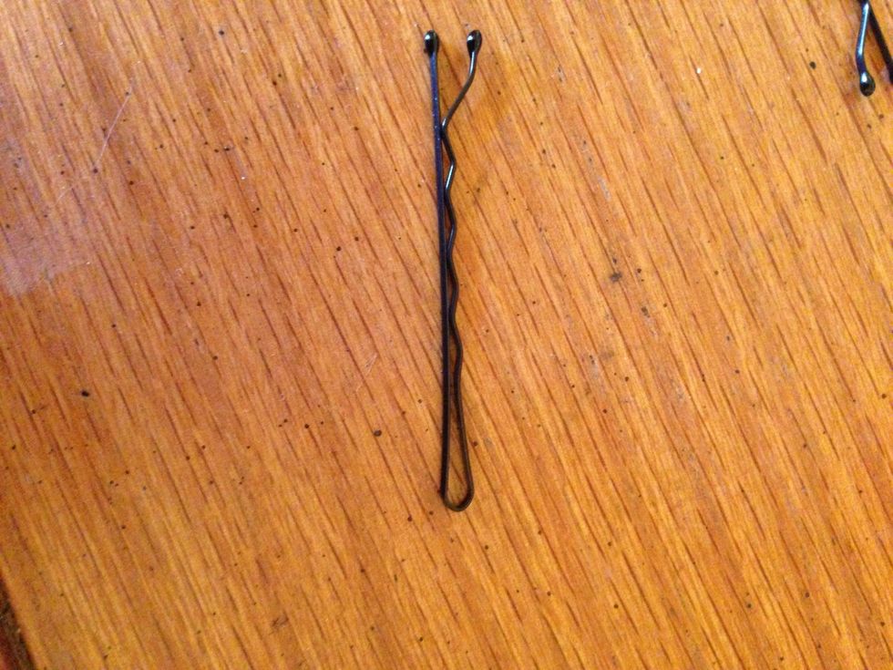 Bobby pin time! ( get bobby pins that match your hair color it will look nicer! )