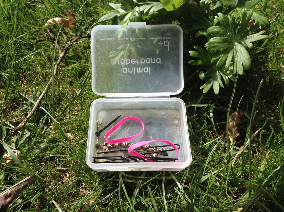 Bobby pins and hair ties! I like to keep mine in a case :)