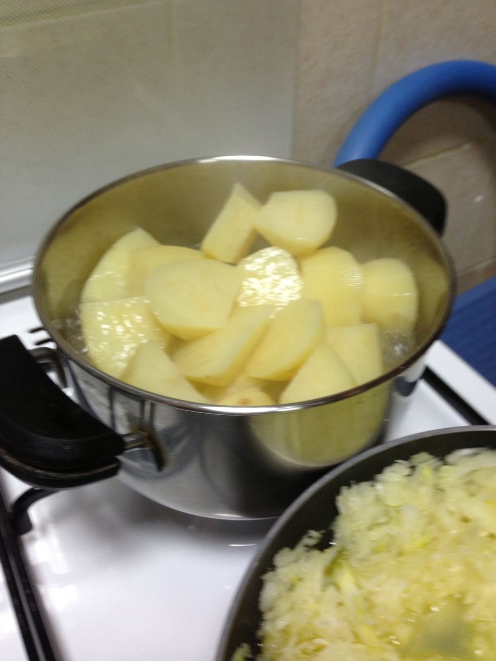Boil 5 piecs of potato heads i usually peelandboil in salted water