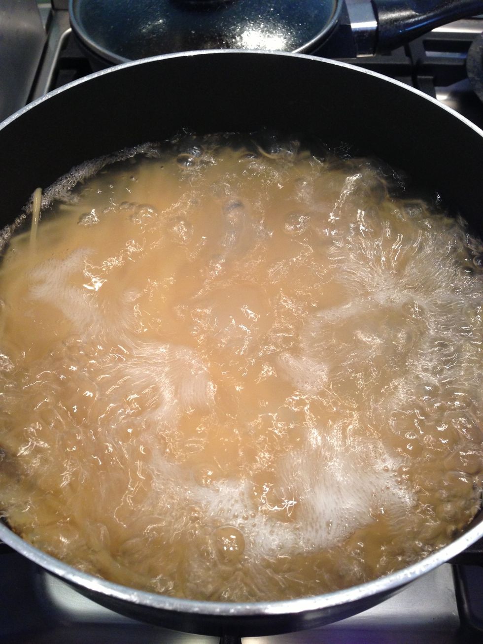 Boil big pot of water (total pot will be 2/3 water, 1/3 spaghetti) Add pasta / spaghetti and cook to instructions as per packet