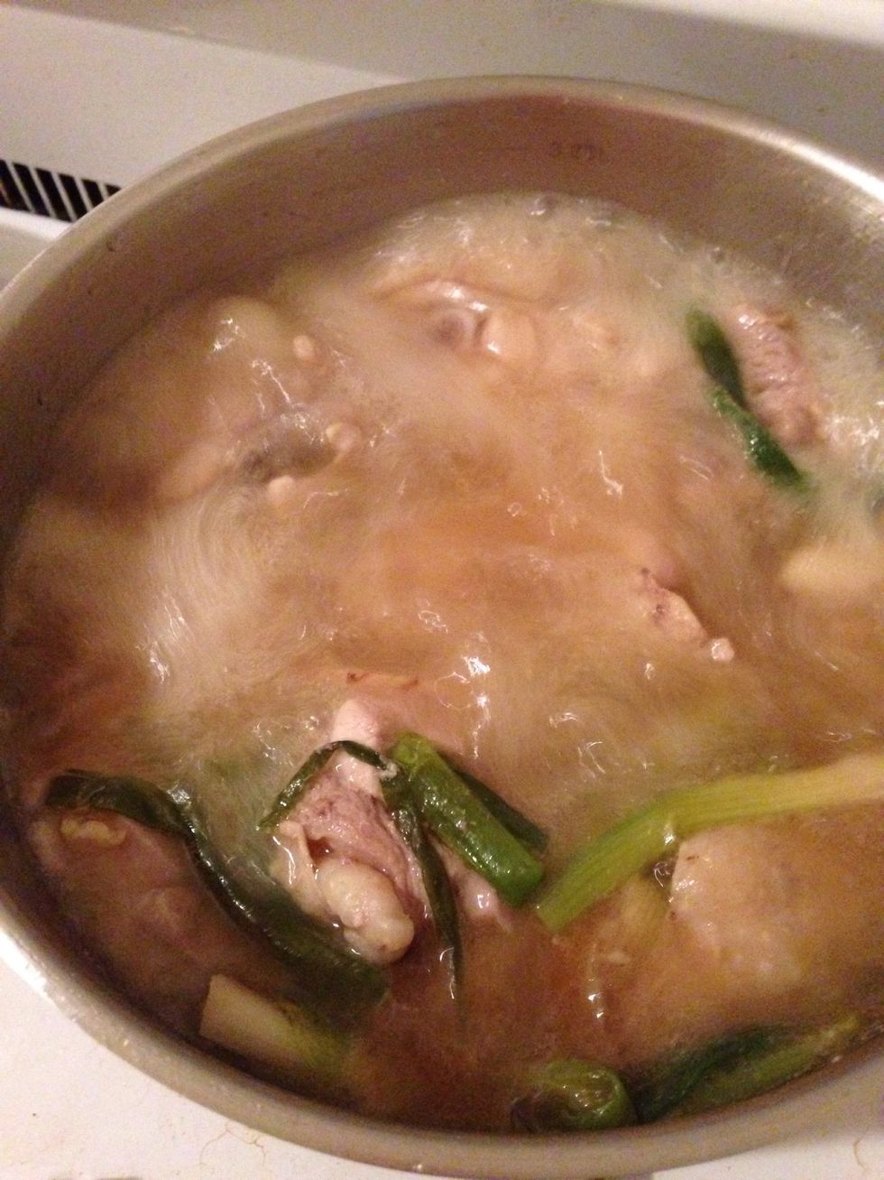 Boil. Boil. Boil and keep boiling for 30 mins. Add salt to taste. At this point, if you  think the taste of alcohol is too strong, you can keep boiling the soup until alcohol get burned off.