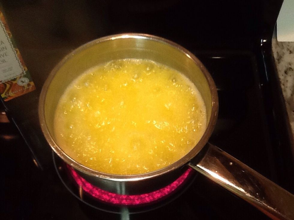 Boil butter, sugar, and margarine for 3 minutes, stirring constantly.