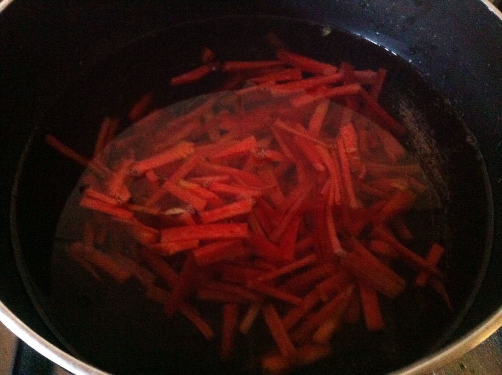 boil carrots. You can add more veggies or corns according to your taste