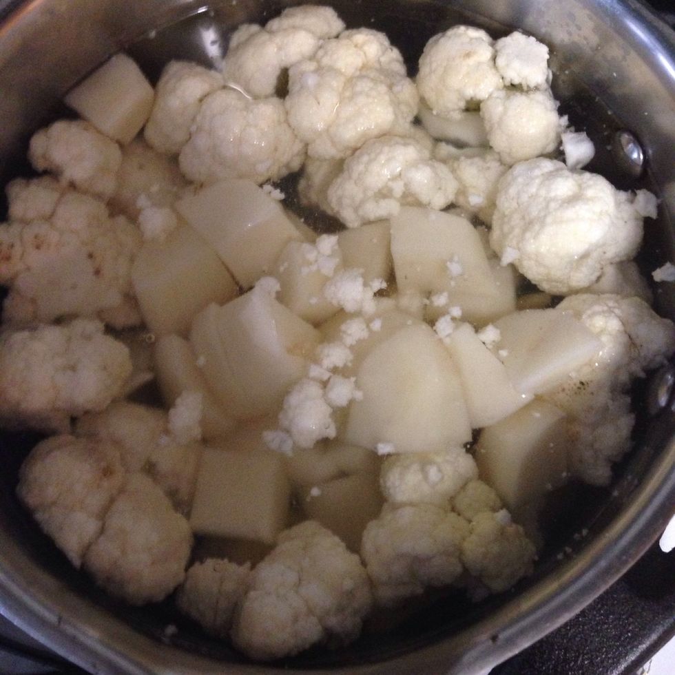 Boil cauliflower florets and potato. Once soft blend it or use a potato ricer.