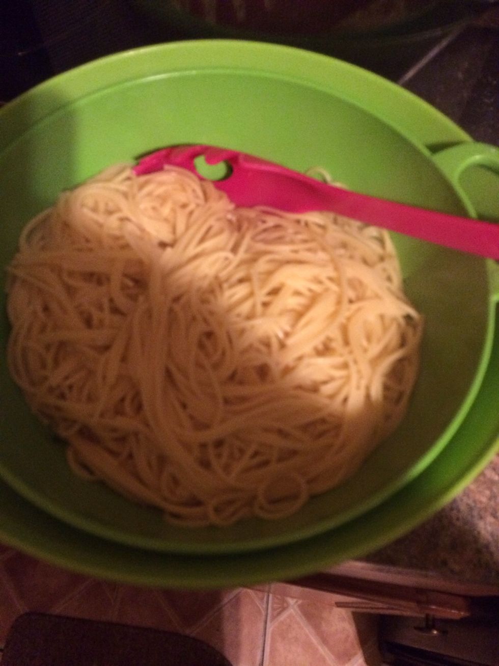 Boil, cook and drain the pasta. While hot mix in a tbls of butter to avoid the pasta sticking.