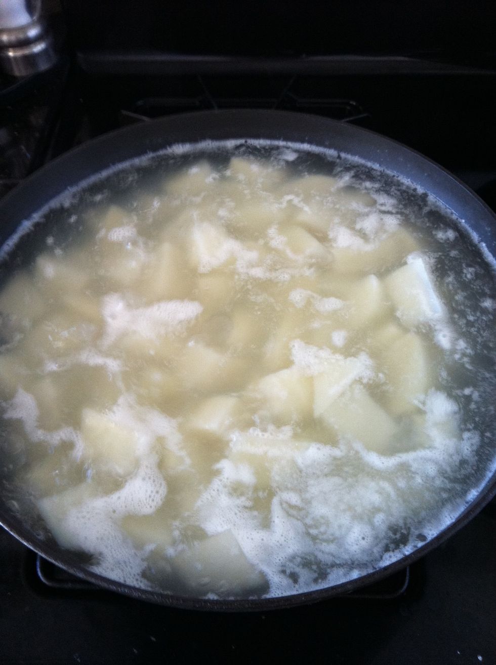 Boil cubed potatoes till fork tender