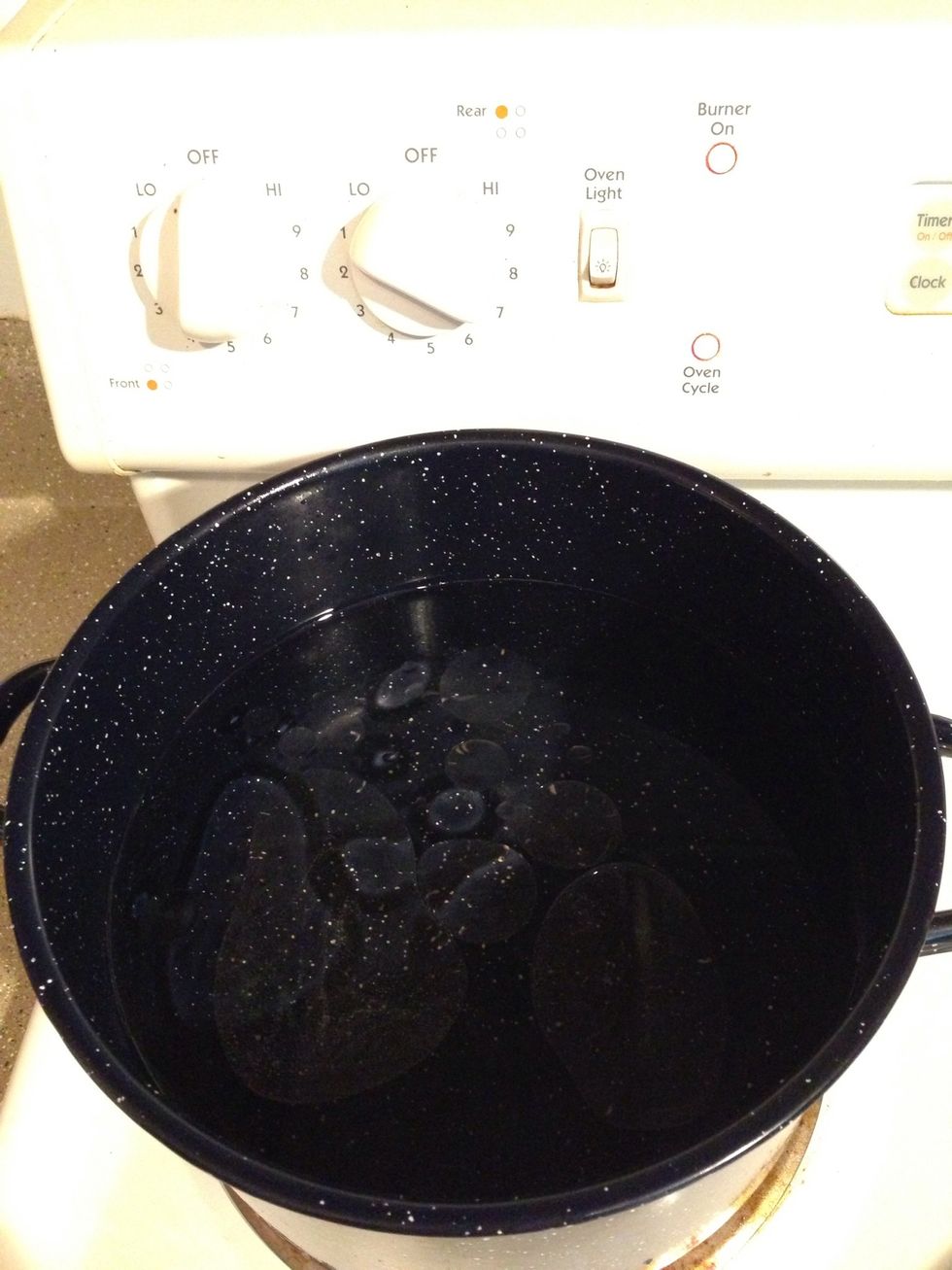 Boil enough water to cover spaghetti noodles