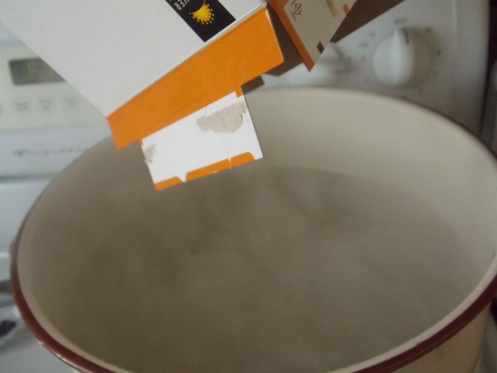 Boil macaroni.