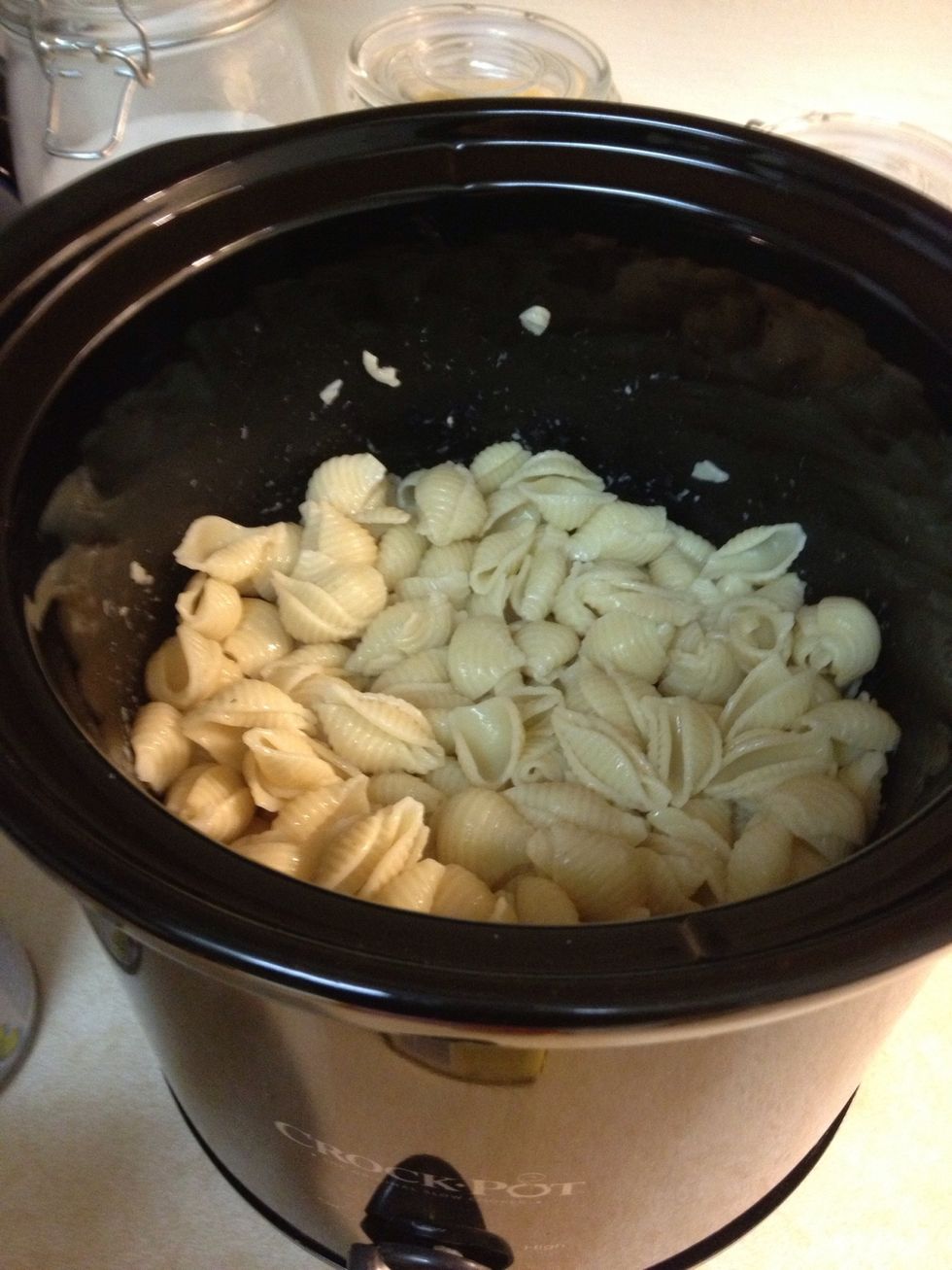 Boil noodles of your choice & put it in a warm crock pot with a little water.