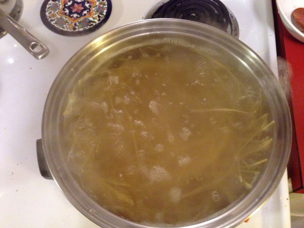 Boil noodles with a pinch of salt for flavor and to help the water boil faster.