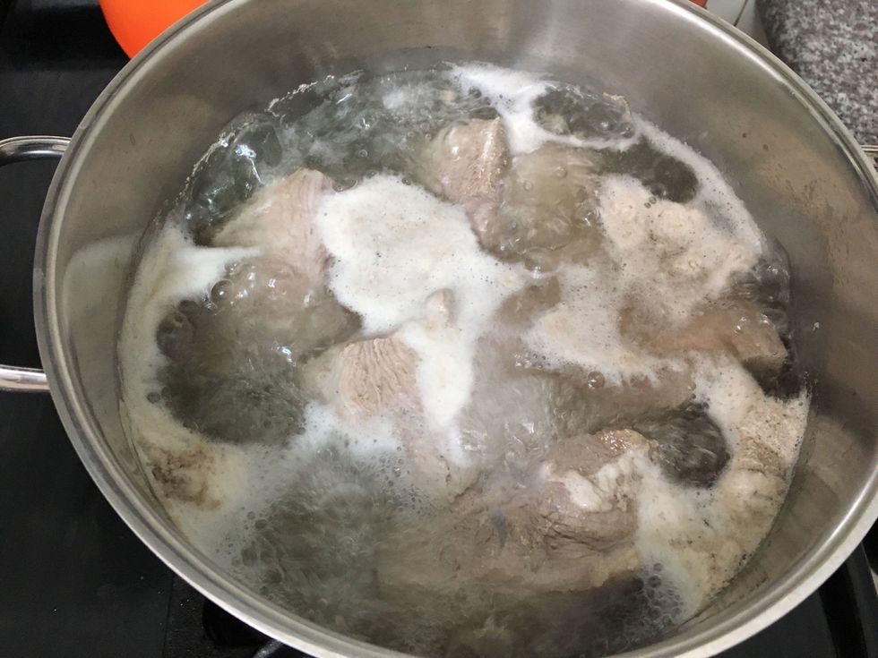 Boil on high for 15 minutes. Work on the shrimp while it boils. After 15 minutes just turn off the heat and leave the meat there. We are going for medium rare.