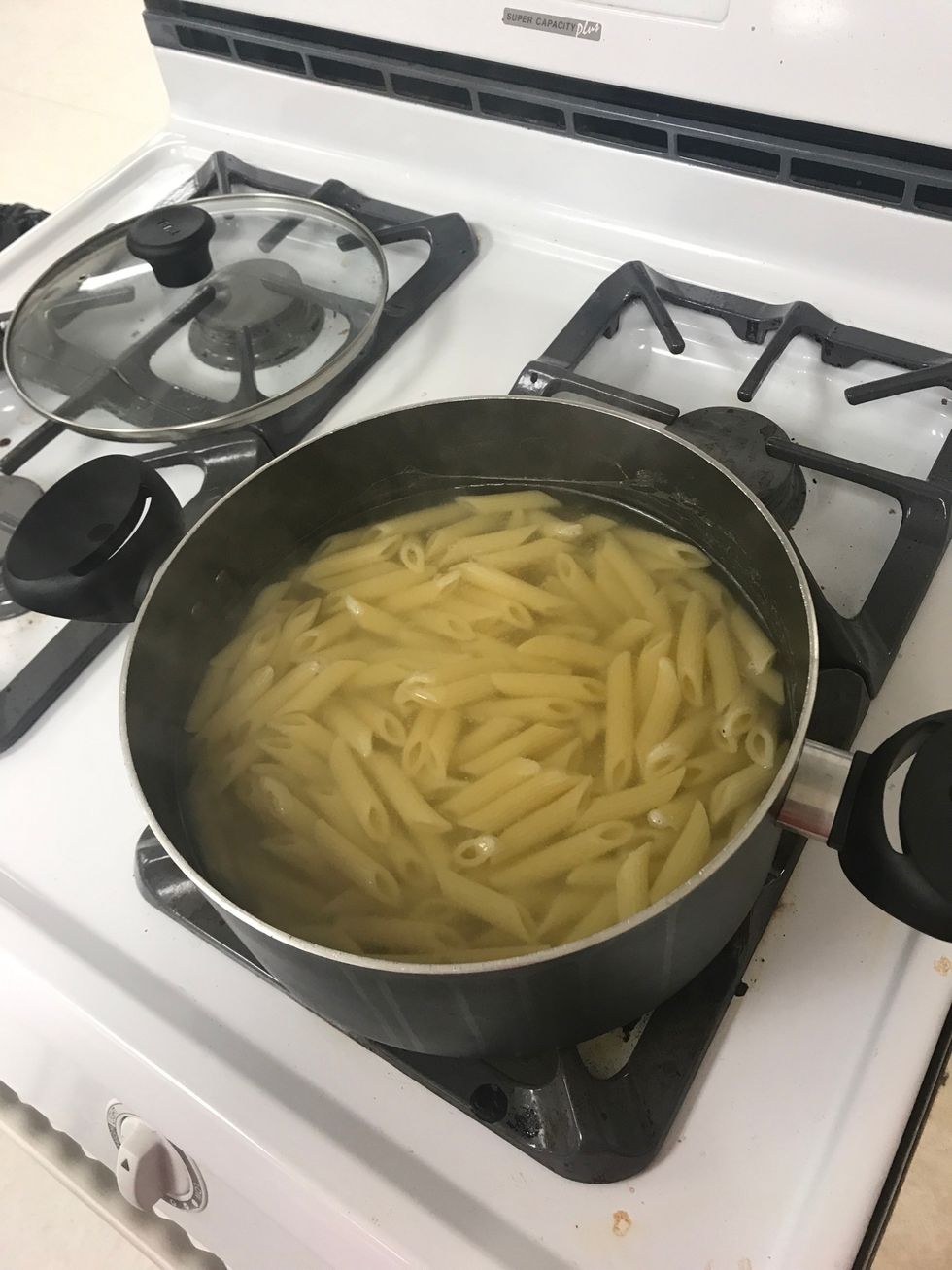 Boil one package of pasta noodles Preheat oven to 375