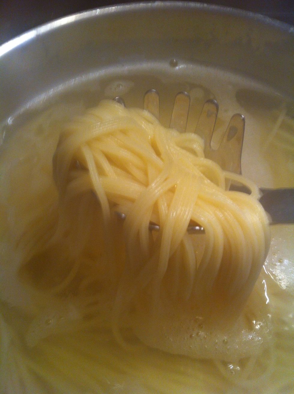 Boil only 5 min. Take out a strand and taste. Is it done with still a bite? Perfect! That's al dente. Get off heat and out of that water! One more minute it turns to mush.