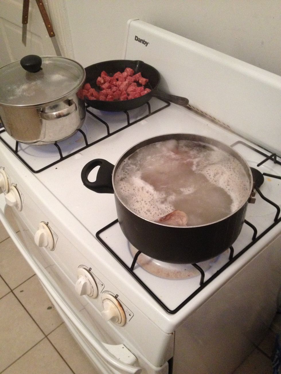 Boil pickle meat and saut\u00e9 smoked sausage