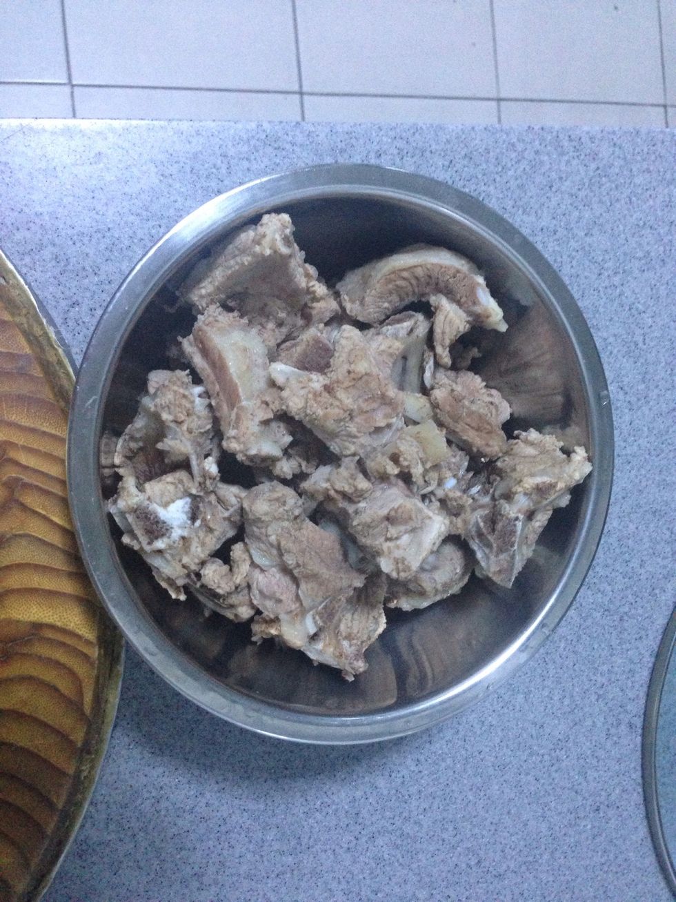 Boil pork for 5 mins, then get rid of blood in raw pork and foam on boiled water.