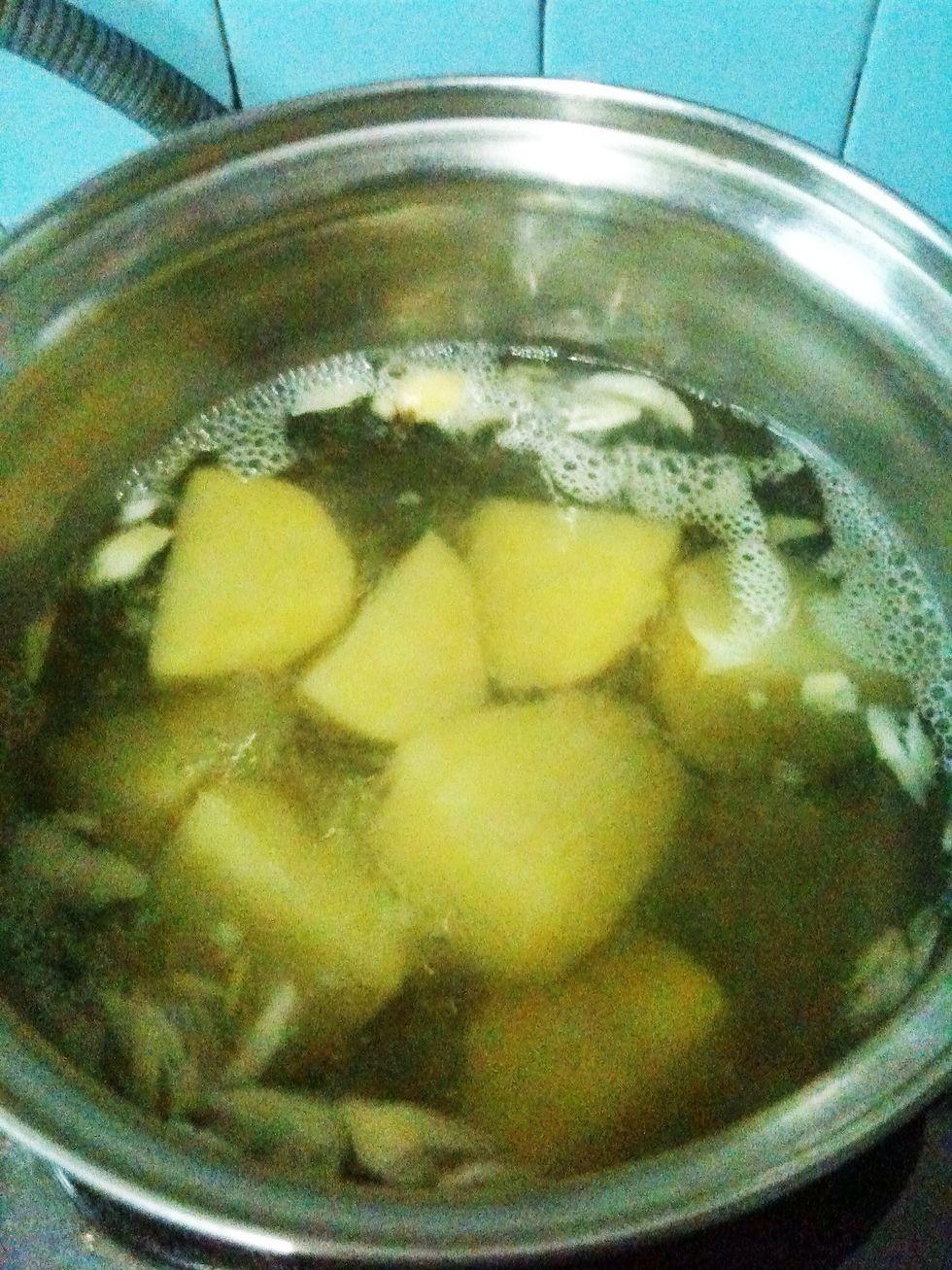 Boil potatoes on hot water for about 20 minutes. I like to add some garlic to make it tastier.