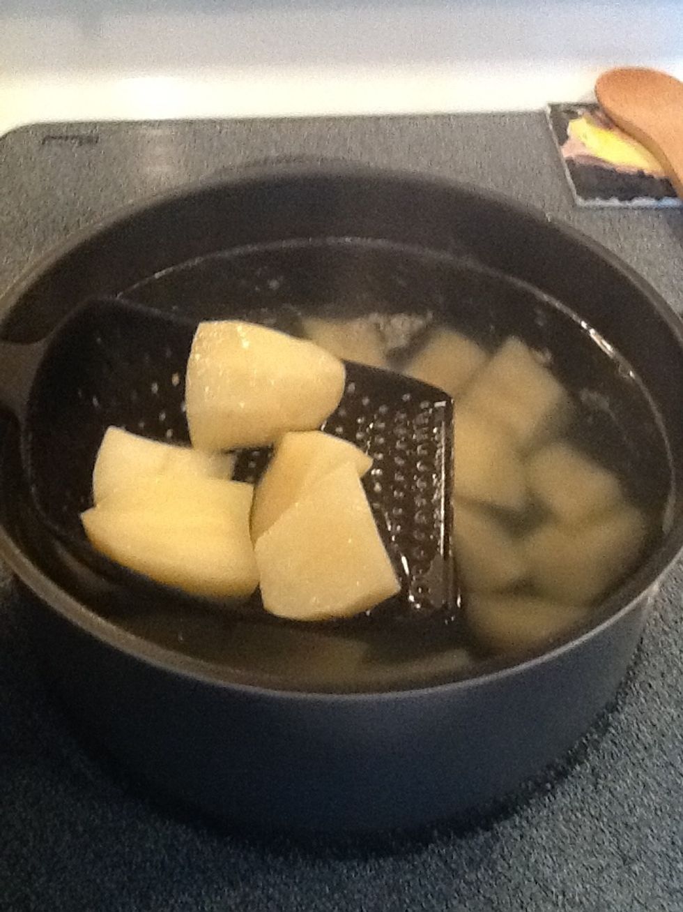 Boil potatoes until tender. You should be able to use a fork and easily cut through the potato.